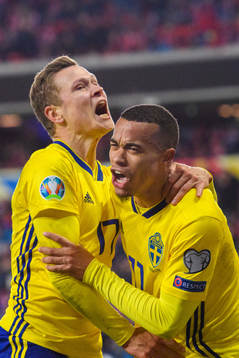Robin Quaison of Sweden celebrates with Viktor Claesson