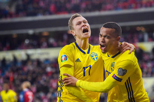 Robin Quaison of Sweden celebrates with Viktor Claesson