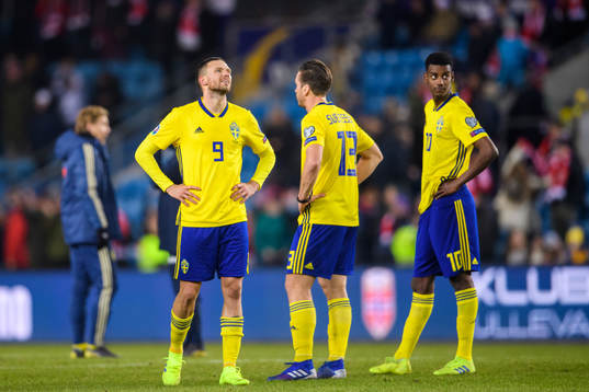 Marcus Berg and Alexander Isak of Sweden looks dejected