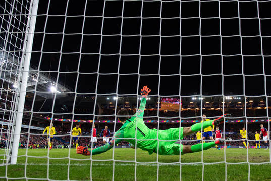 Goalkeeper Rune Almenning Jarstein of Norway saves a