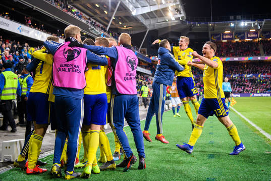 Robin Quaison of Sweden celebrates with teammates