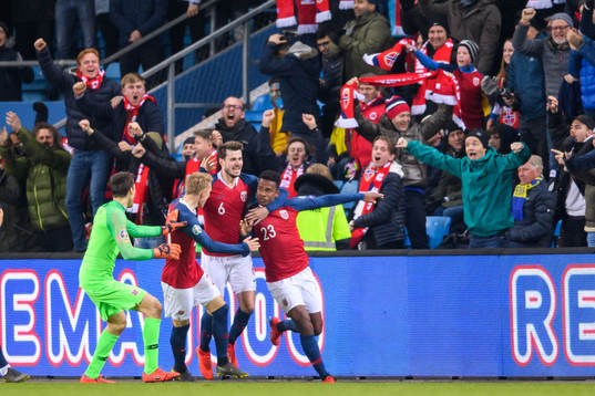 Ola Kamara of Norway celebrates with teammates