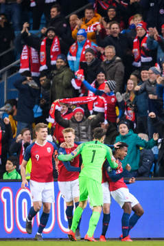 Ola Kamara of Norway celebrates with teammates