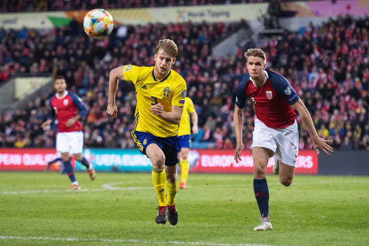 Filip Helander of Sweden and Kristoffer Ajer of Norway