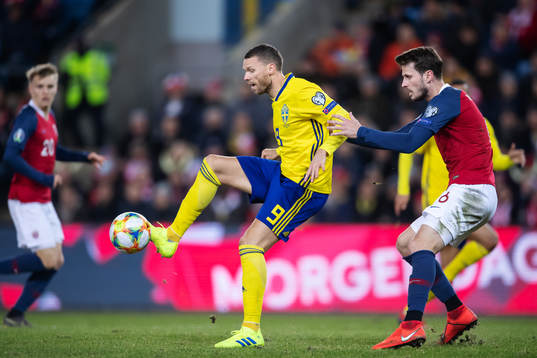 Marcus Berg of Sweden and Håvard Nordtveit of Norway
