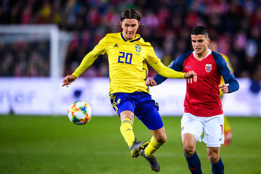 Kristoffer Olsson of Sweden and Mohamed Elyounoussi of