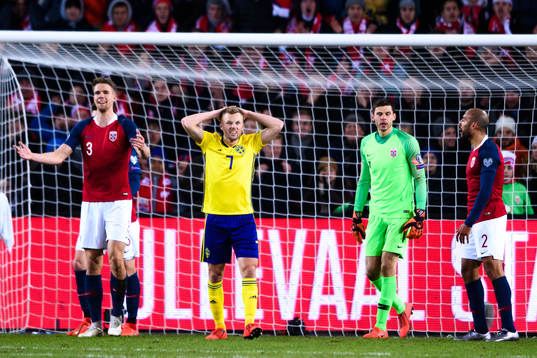 Sebastian Larsson of Sweden looks dejected
