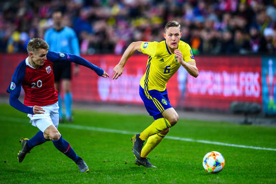Martin Ødegaard of Norway and Ludwig Augustinsson of Sweden