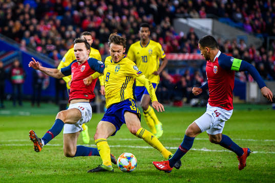 Albin Ekdal of Sweden against Stefan Johansen and Omar