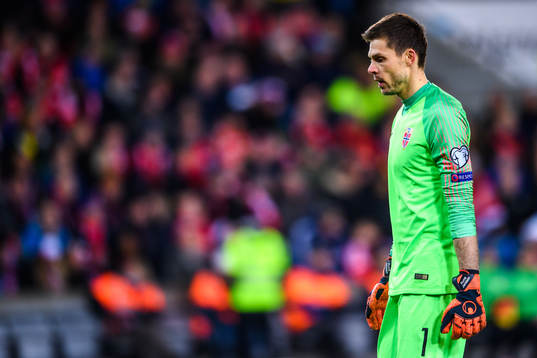 Goalkeeper Rune Almenning Jarstein of Norway looks dejected
