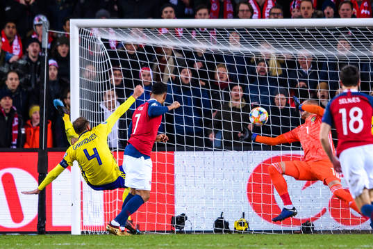 Joshua King of Norway scores the 2-0 goal behind Andreas