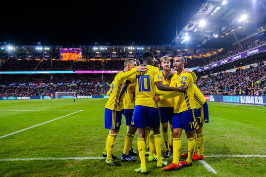 Alexander Isak and Robin Quaison of Sweden celebrate the