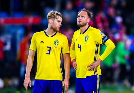 Filip Helander and Andreas Granqvist of Sweden looks