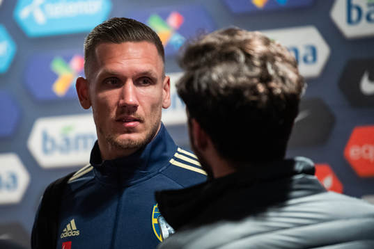 goalkeeper Robin Olsen of Sweden talks to the media