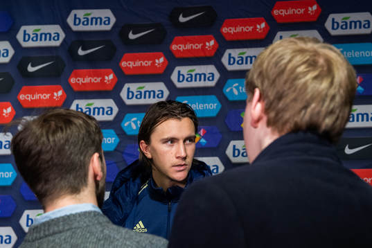 Kristoffer Olsson of Sweden talks to the media