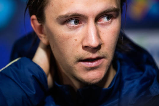 Kristoffer Olsson of Sweden talks to the media