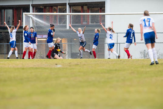 Nora Eide Lie of Kolbotn celebrates with her teammates