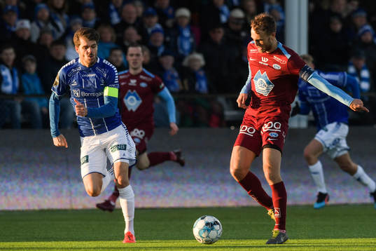 Joachim Thomassen of Sarpsborg 08 and Magnus Eikrem of Molde