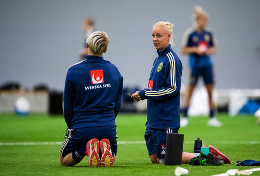 Nilla Fischer and Caroline Seger of the Swedish women