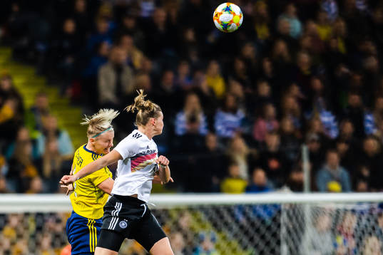 Nilla Fischer of Sweden and Alexandra Popp of Germany