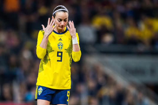 Kosovare Asllani of Sweden looks dejected