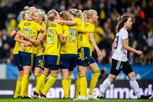 Caroline Seger of Sweden celebrates with teammates