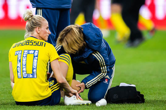Sofia Jakobsson of Sweden receives treatment