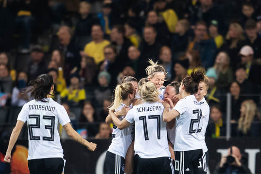 Kathrin Hendrich of Germany celebrates with teammates