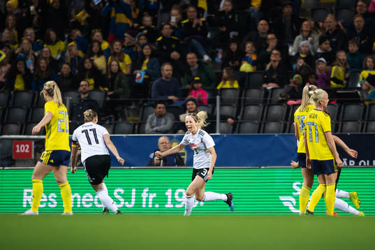 Alexandra Popp and Kathrin Hendrich of Germany celebrate