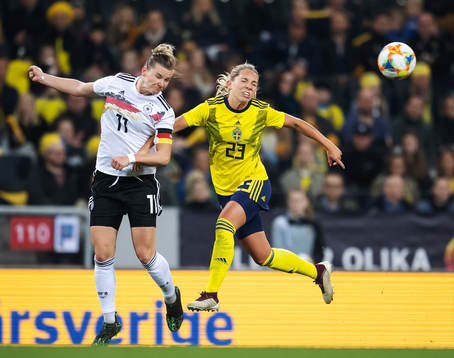 Alexandra Popp of Germany and Elin Rubensson of Sweden