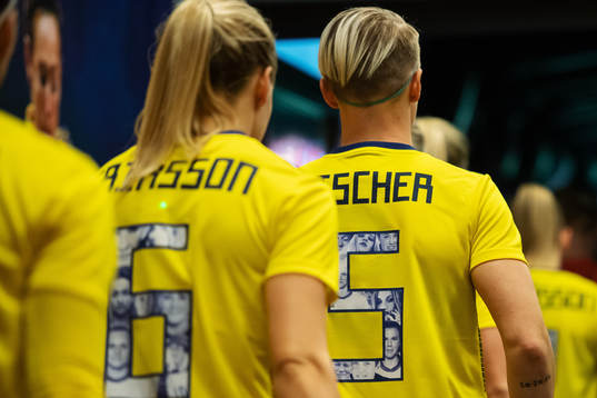 Nilla Fischer of Sweden enter the field