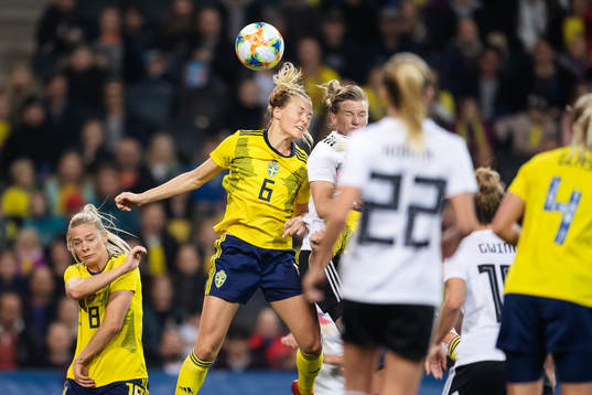 Magdalena Eriksson of Sweden and Alexandra Popp of Germany