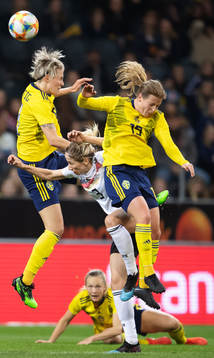 Lina Hurtig and Anna Anvegård of Sweden in action against