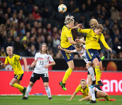 Lina Hurtig and Anna Anvegård of Sweden in action against