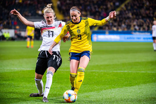 Verena Schweers of Germany and Kosovare Asllani of Sweden