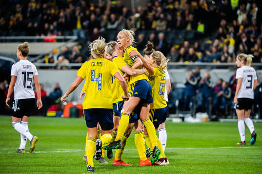 Caroline Seger of Sweden celebrates with teammates