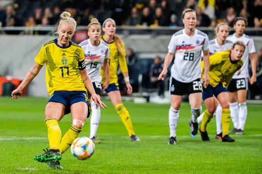 Caroline Seger of Sweden scores 1-2 with a penalty