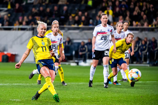 Caroline Seger of Sweden scores 1-2 with a penalty