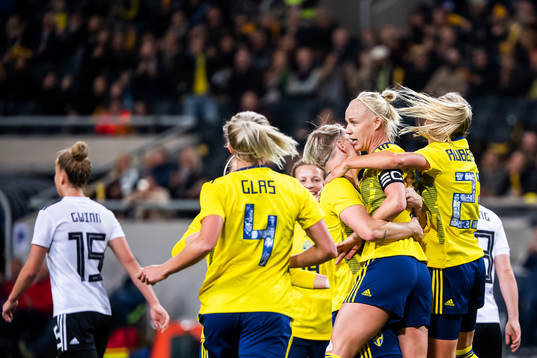Caroline Seger of Sweden celebrates with teammates