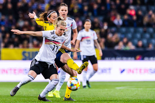 Kosovare Asllani of Sweden and Verena Schweers of Germany