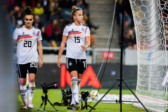 Lina Magull and Giulia Gwinn of Germany