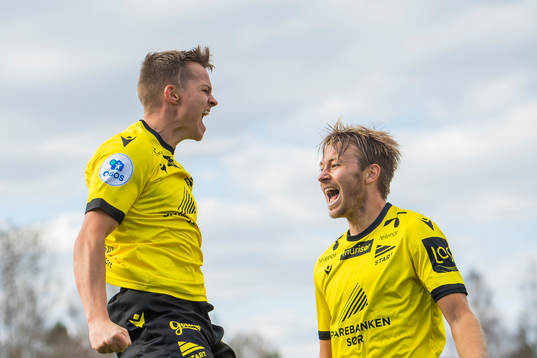 Aron Sigurdarson of Start celebrates with Henrik Robstad