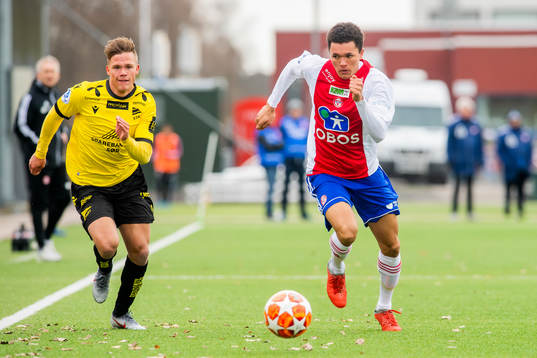 Eirik Wichne of Start and Didi Dodou Gaye of KFUM