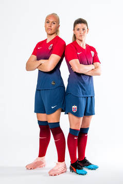 Maria Thorisdottir and Maren Mjelde of Norway pose for a