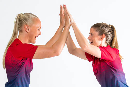 Maria Thorisdottir and Maren Mjelde of Norway pose for a