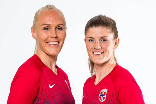 Maria Thorisdottir and Maren Mjelde of Norway pose for a