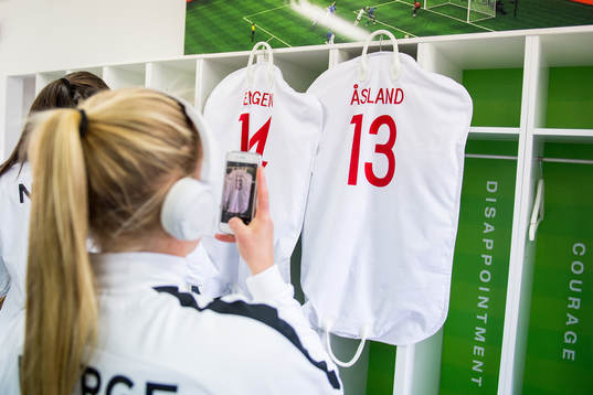 Therese Sessy Åsland of Norway takes a picture of her kit