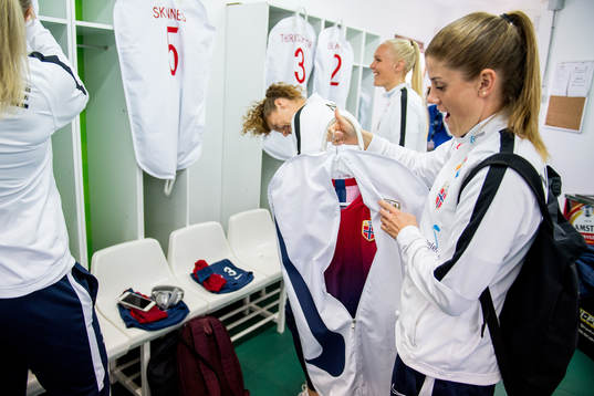 Maren Mjelde of Norway opens her kit bag in the dressing