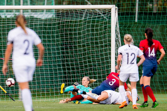 Rosie White of New Zealand scores 0-1 past goalkeeper
