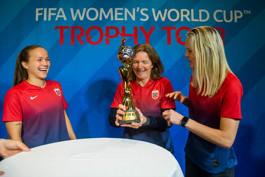 Guro Reiten, Hege Riise and Ingrid Hjelmseth of Norway